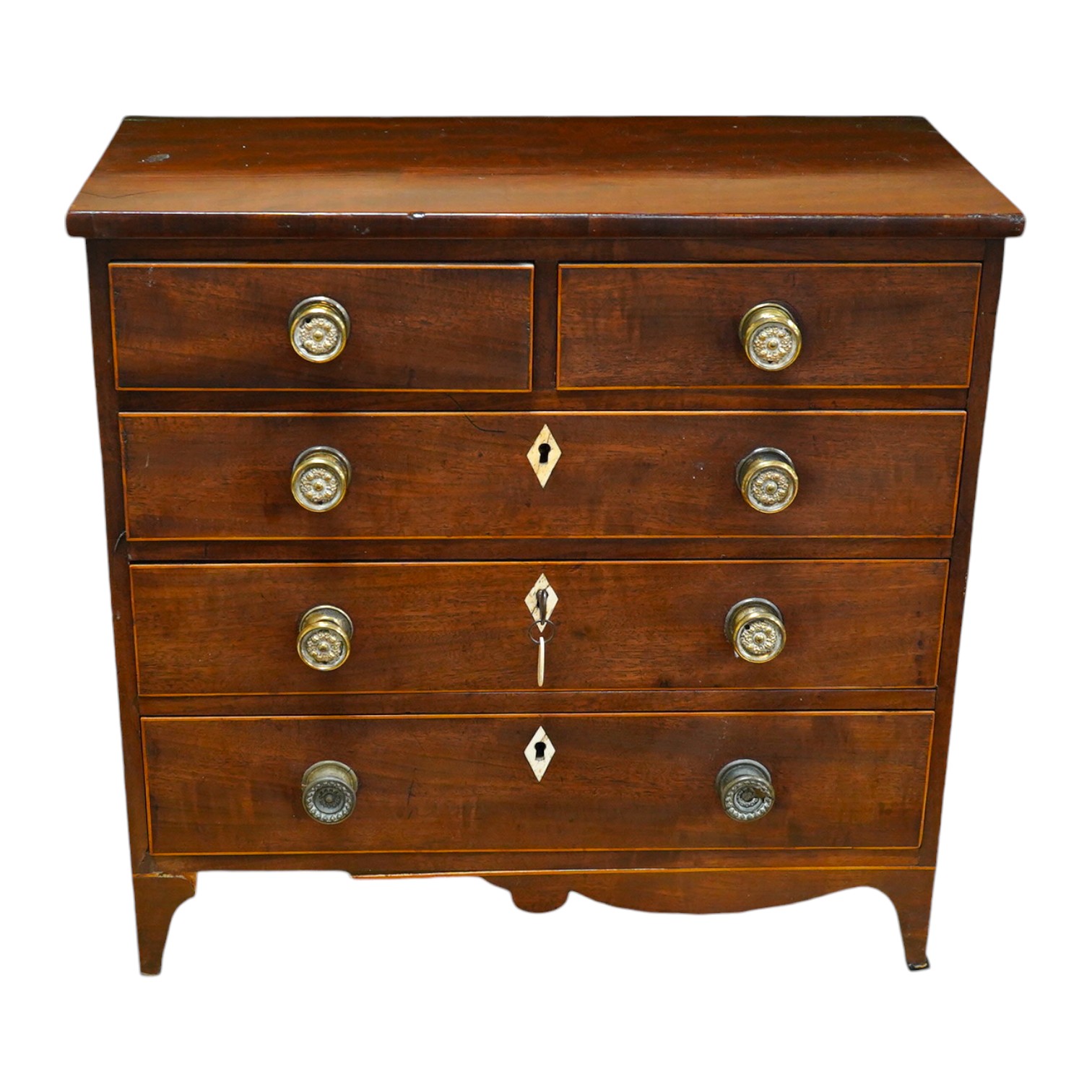 An early 20th century mahogany miniature chest of drawers, 39cm tall. Condition - one piece detached